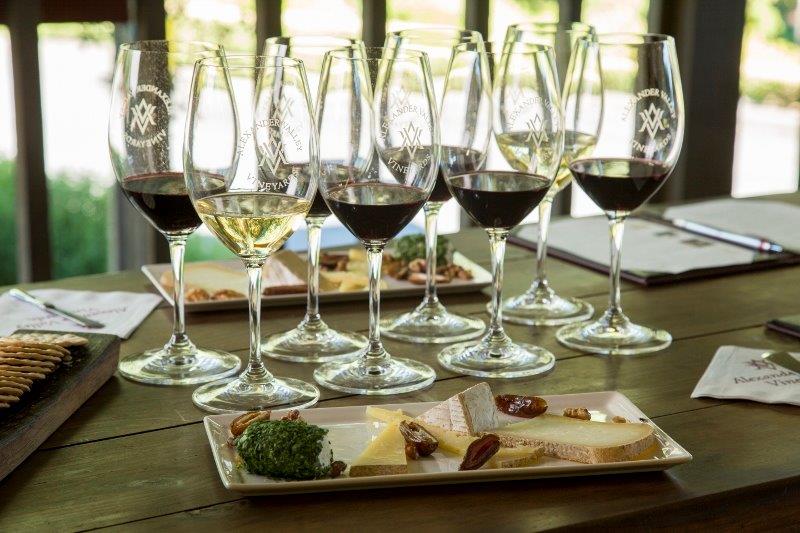 AVV Wine and Cheese pairing - AVV wine glasses and cheese plate on wooden table
